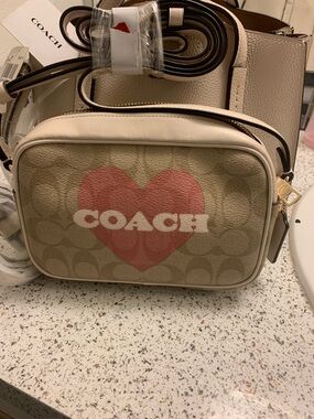 Coach Beige Signature Canvas Crossbody with Pink Heart